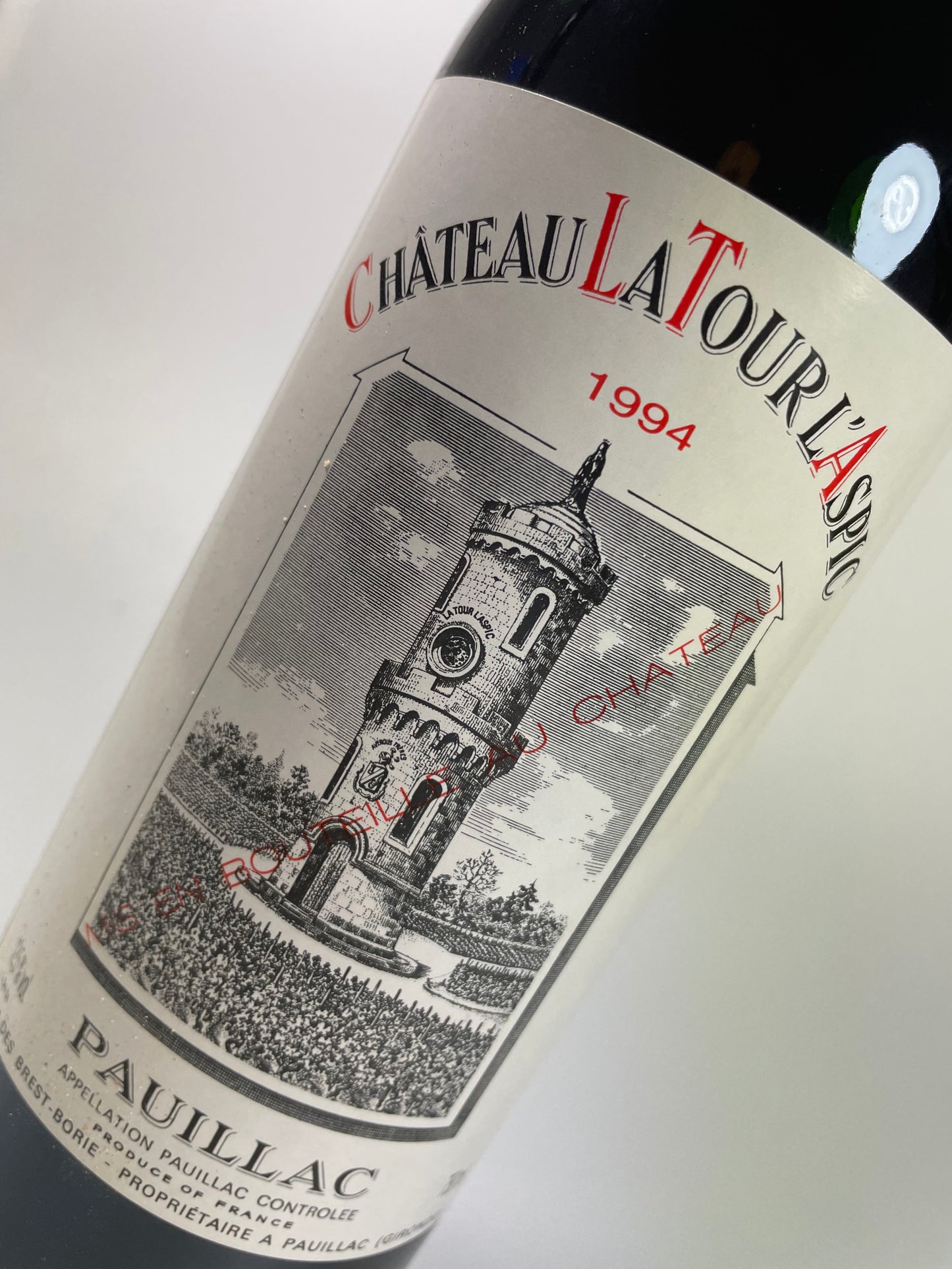 Etikett mit Turm und Aufschrift La Tour L'Aspic 1994 Pauillac