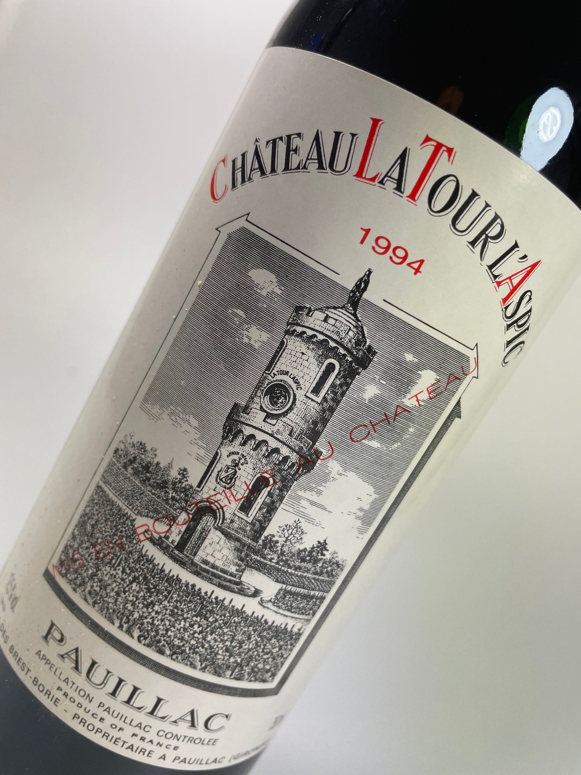 Etikett mit Turm und Aufschrift La Tour L'Aspic 1994 Pauillac